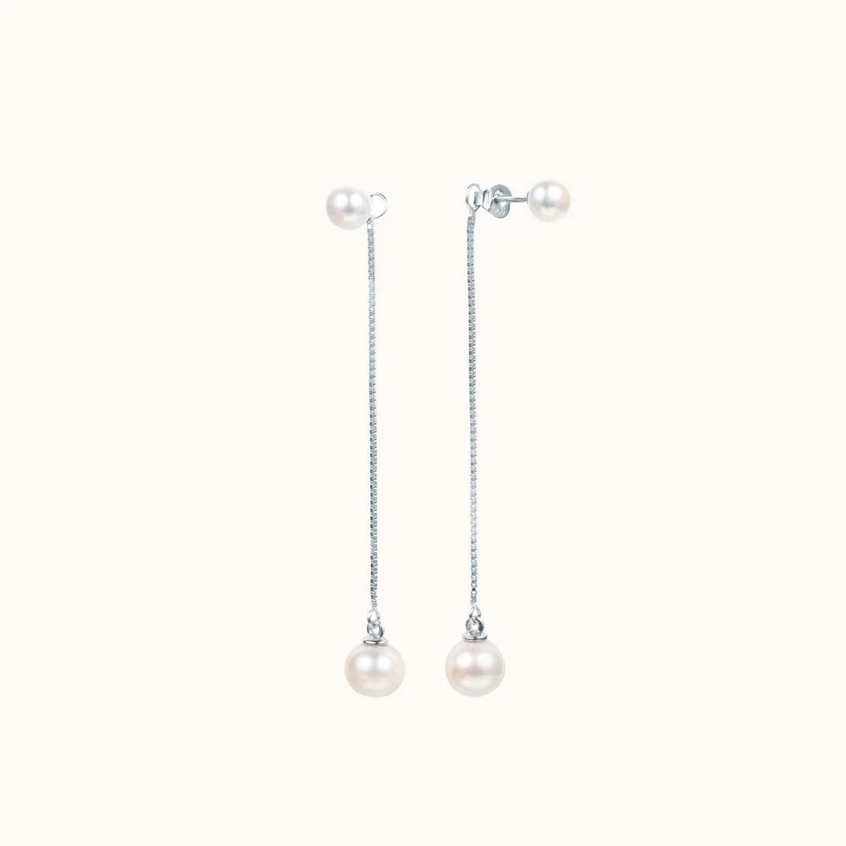Gentle Pearl Dangle Earrings sold by Jescojes