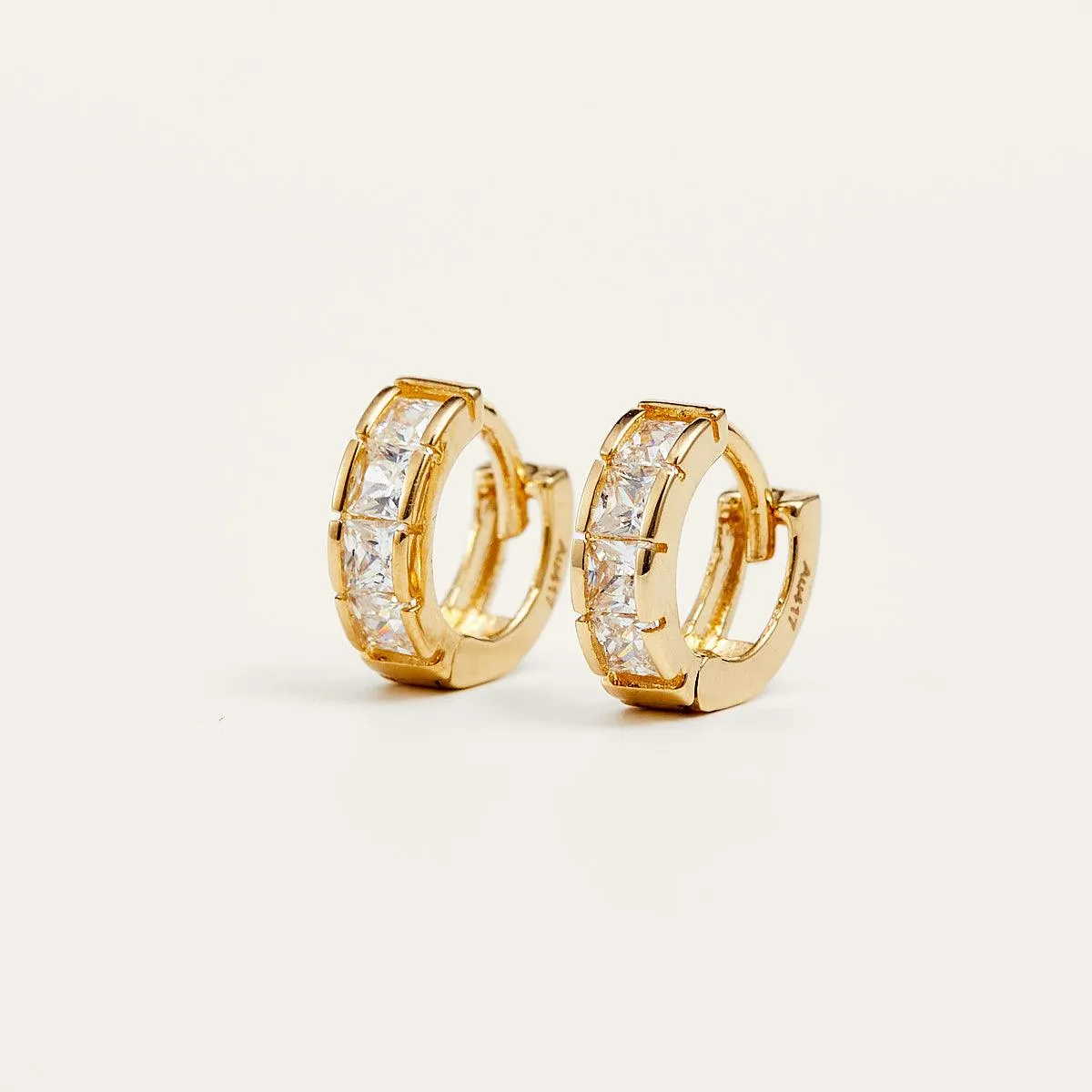 Shining Gold Pavé Huggie Hoop Earrings sold by Jescojes