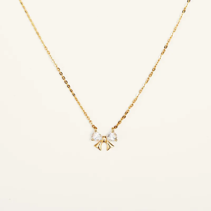 Shining Bow Gold Pendant Necklace sold by Jescojes