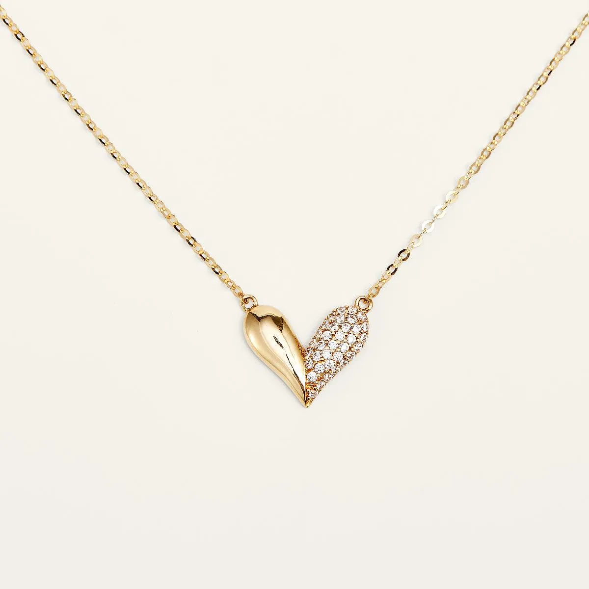 Elegant Heart Gold Pendant Necklace sold by Jescojes