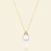 18K Gold Balanced Delta Pearl Pendant Necklace sold by Jescojes