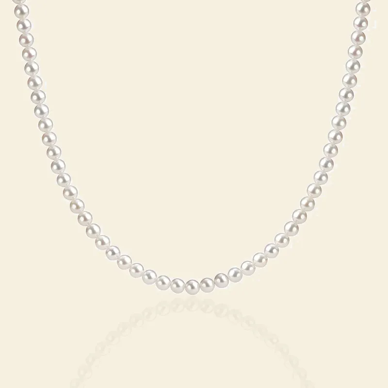 Charming 5-6mm White Freshwater Pearl Strand Necklace sold by Jescojes