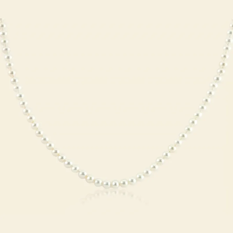 Petite 4-5mm White Freshwater Pearl Strand Necklace sold by Jescojes