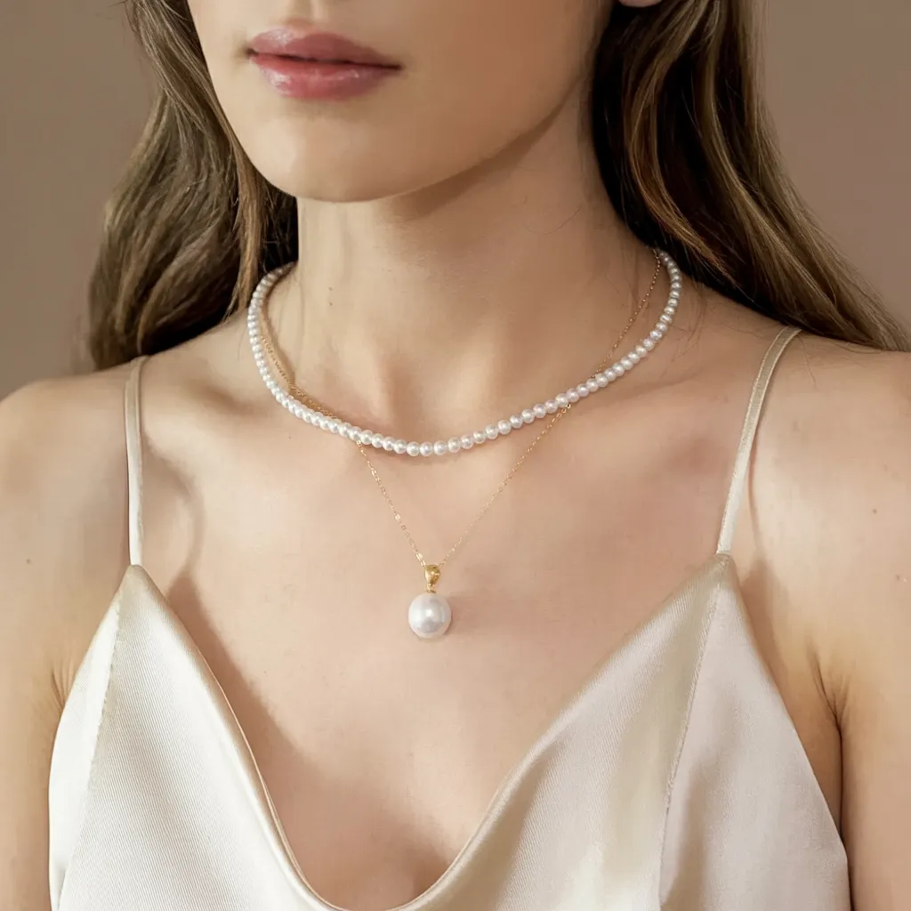 Petite White Freshwater Pearl Strand Necklace 4-5mm sold by Jescojes product image thumbnail 3