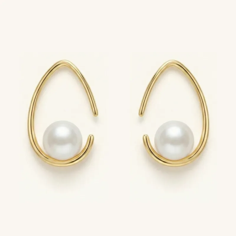 Crescent Charm Freshwater Pearl Earrings sold by Jescojes