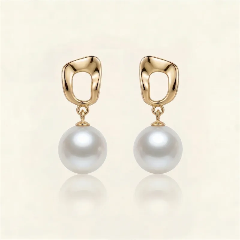 The Frame | Pearl Drop Earrings made by Crockett & Jones