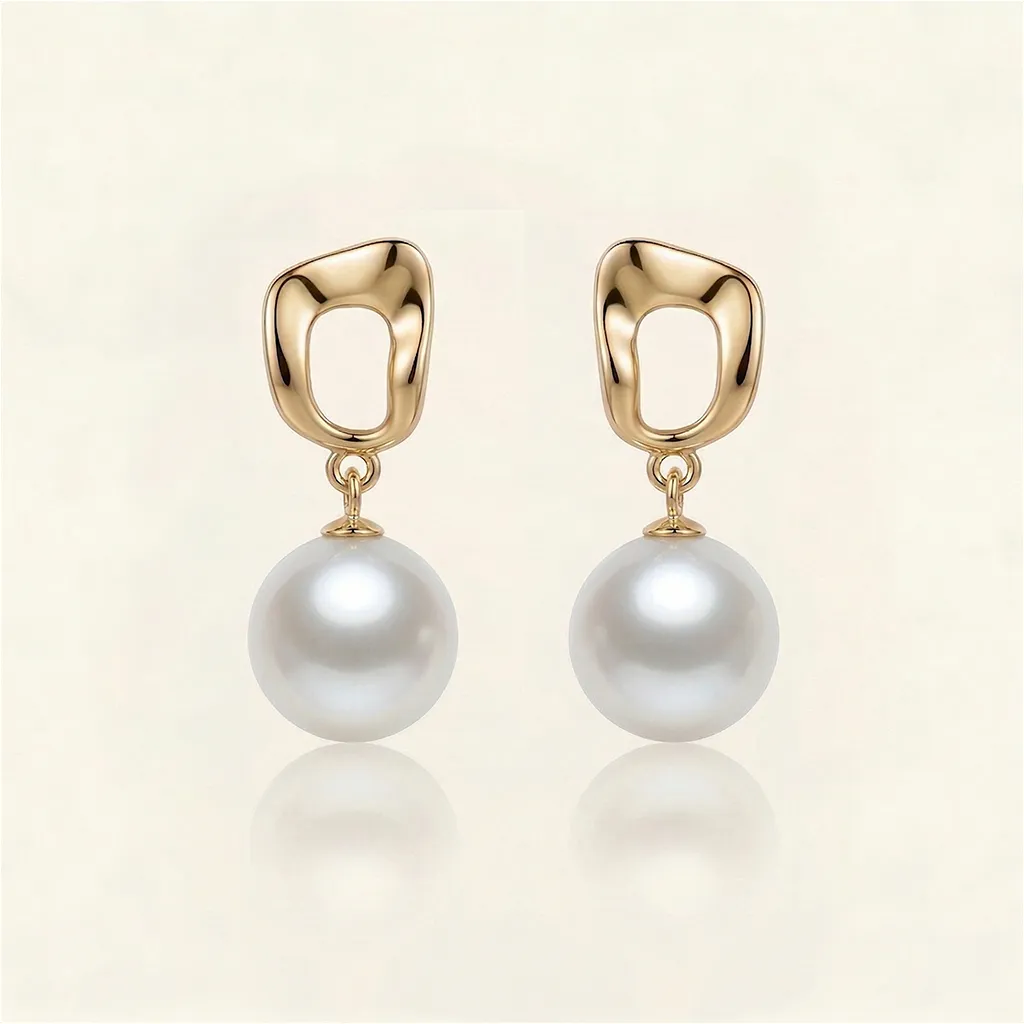 The Frame | Pearl Drop Earrings sold by Jescojes