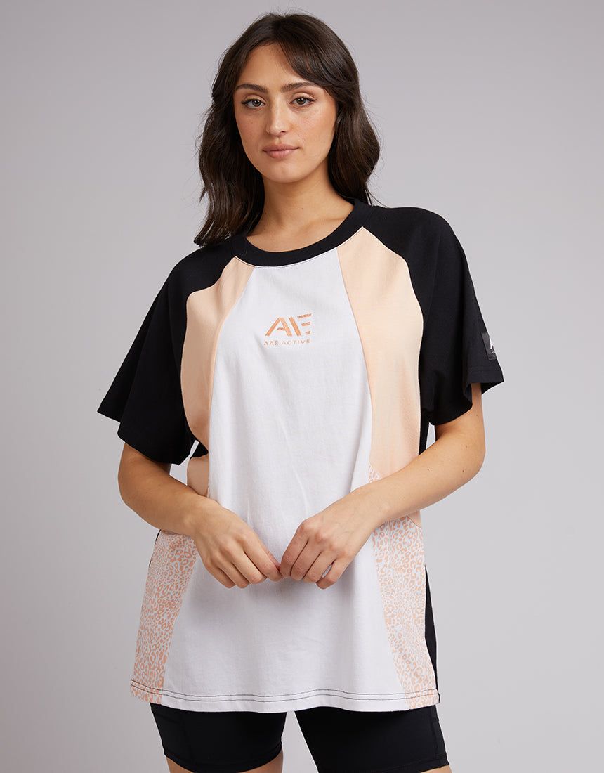 Champions Tee Sand sold by All About Eve