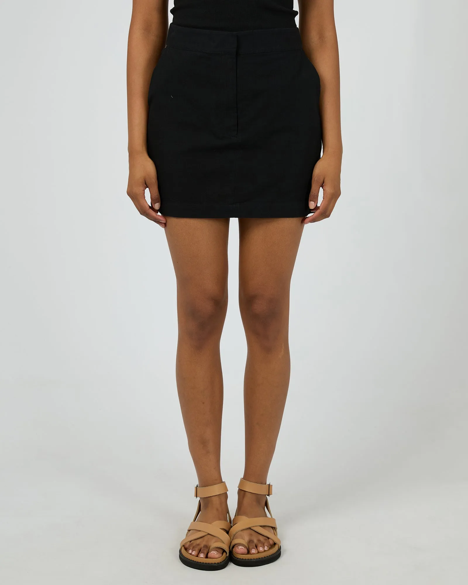 Essential Mini Skirt Black sold by All About Eve