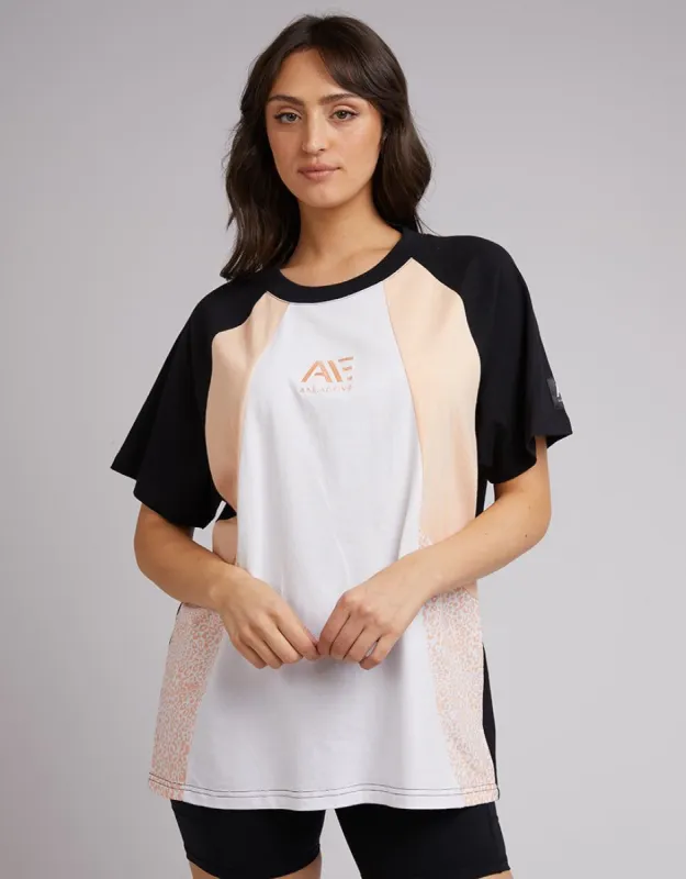 Champions Tee Sand sold by All About Eve