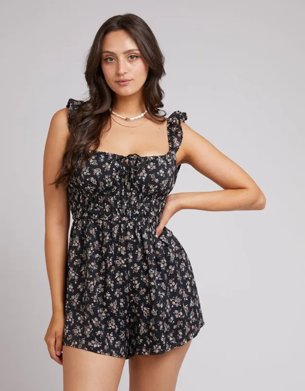 Maya Floral Playsuit Black sold by All About Eve