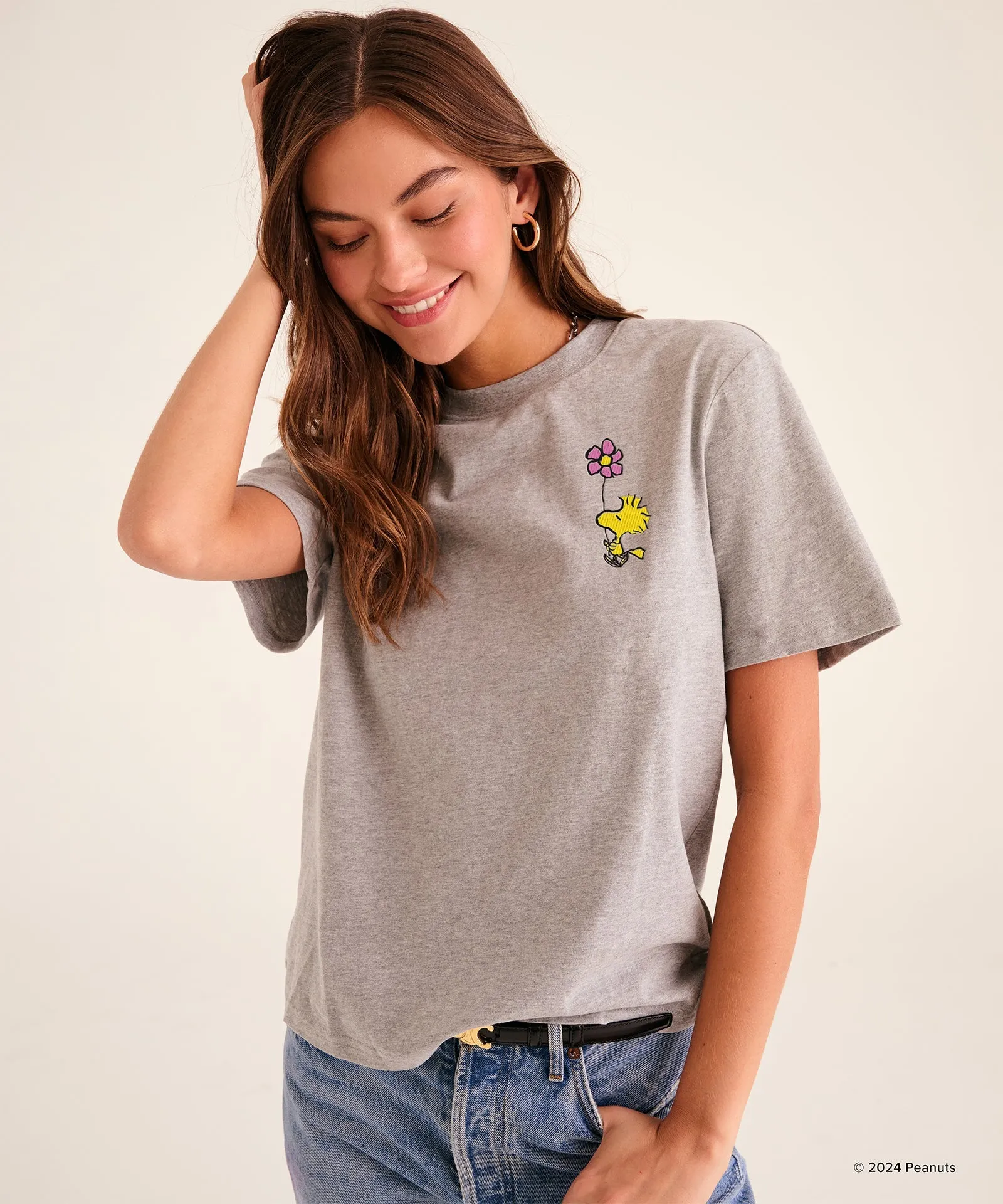 Peanuts Woodstock Flower Tee sold by Naadam