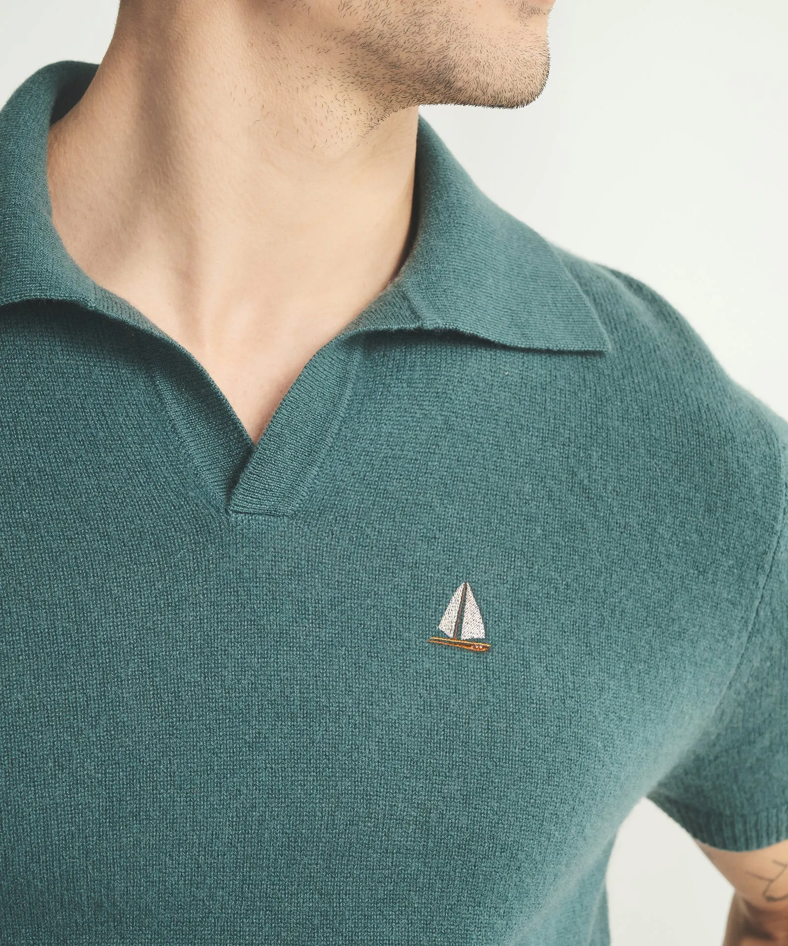 Men’s Embroidered Sailboat Short Sleeve Polo sold by Naadam