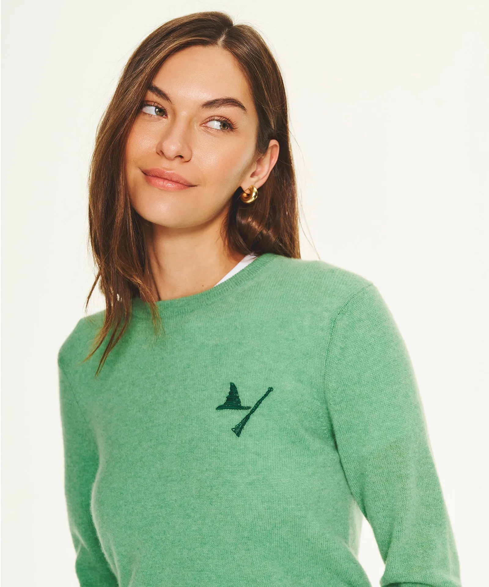 Wicked Elphaba Hat and Broomstick Cashmere Sweater sold by NAADAM