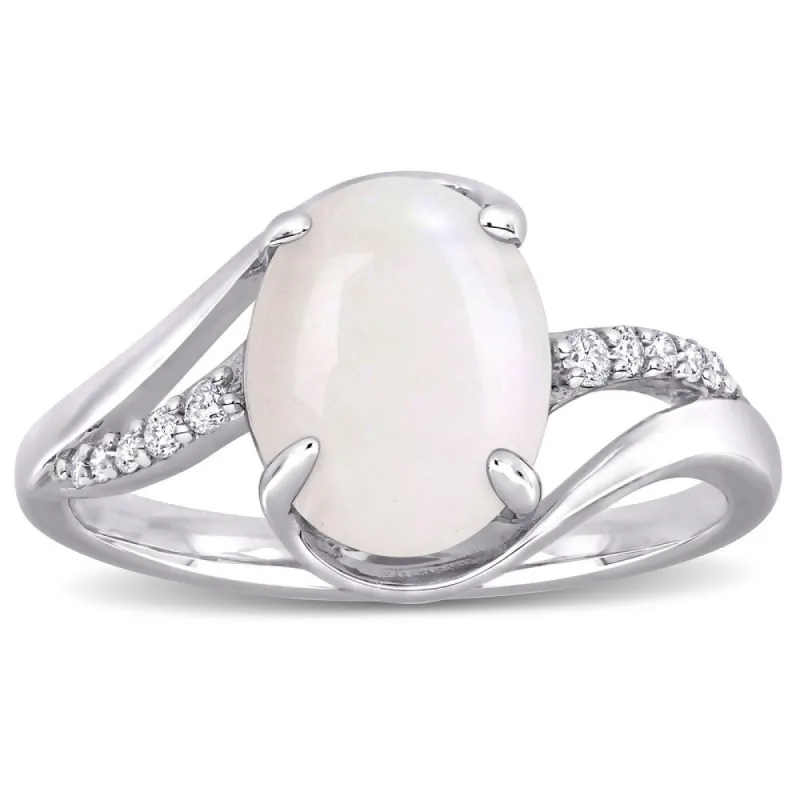 Miadora Sterling Silver Oval-Cut Opal and 1/10ct TDW Diamond Bypass Ring sold by Zulily