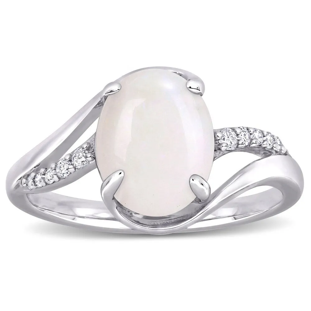 Miadora Sterling Silver Oval-Cut Opal and 1/10ct TDW Diamond Bypass Ring sold by Zulily
