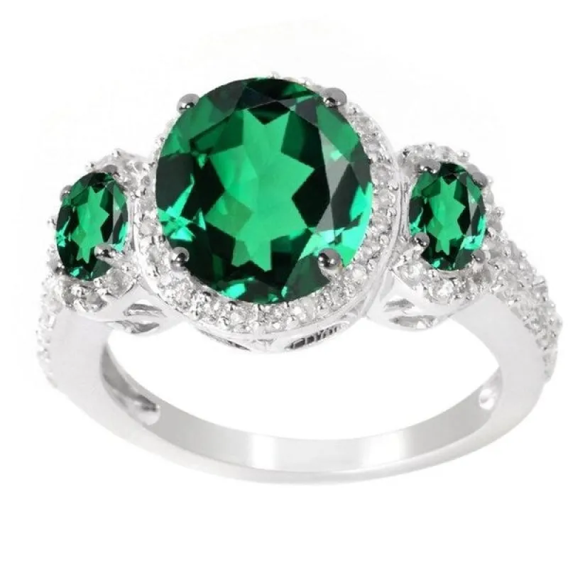 Sterling Silver Oval Emerald and White Topaz Three Stone Halo Ring - Green sold by Zulily