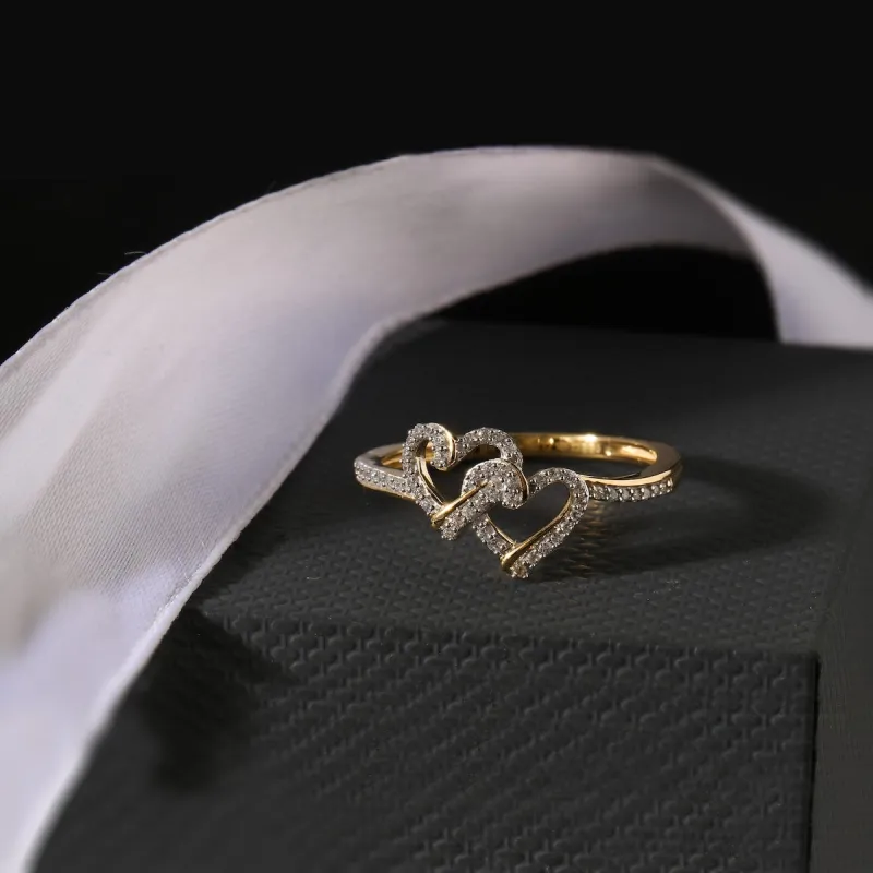 1/8ct TDW Diamond Double Heart Ring in 10k Gold sold by Zulily