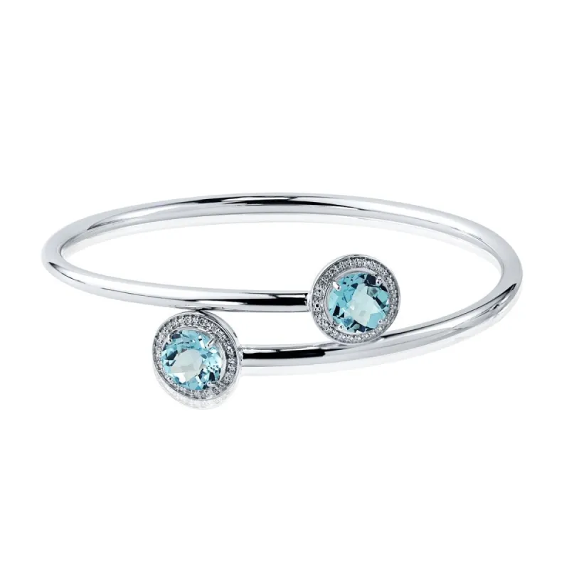 Auriya 4ct Sky Blue Topaz and Halo Diamond Bangle Bracelet Gold over Silver sold by Zulily