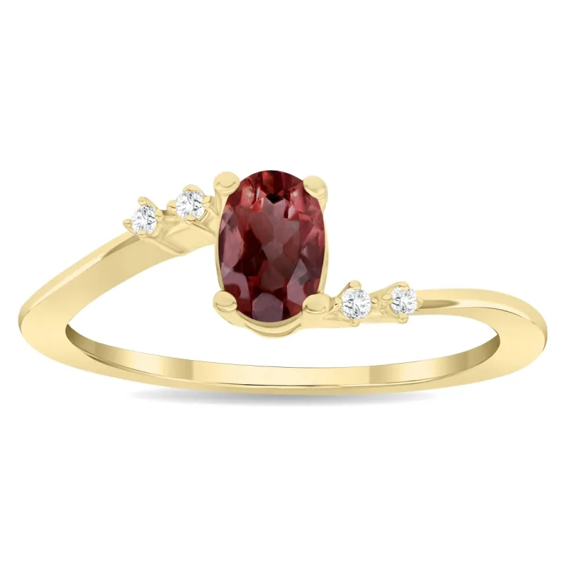 Women's Oval Shaped Garnet and Diamond Tierra Ring in 10K Yellow Gold sold by Zulily