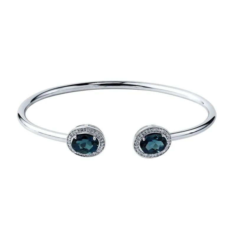 Auriya 3ct Oval London Blue Topaz Open Bangle Bracelet with Diamond Accents Gold over Silver sold by Zulily
