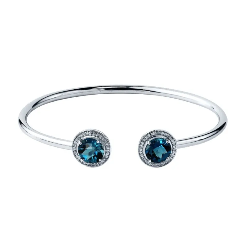 Auriya 4ct London Blue Topaz Gold over Silver Bangle Bracelet with Diamond Accents sold by Zulily