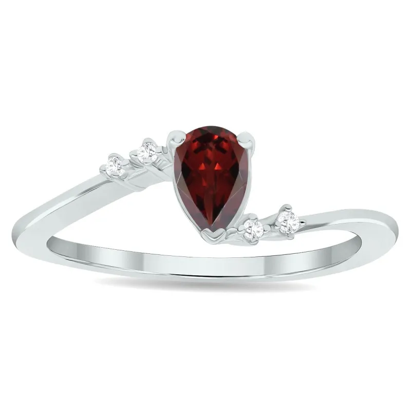 Women's Garnet and Diamond Wave Ring in 10K White Gold sold by Zulily