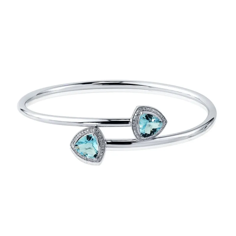 Auriya 4ct Trillion-Cut Sky-Blue Topaz Gold over Silver Bangle Bracelet with Diamond Accents sold by Zulily