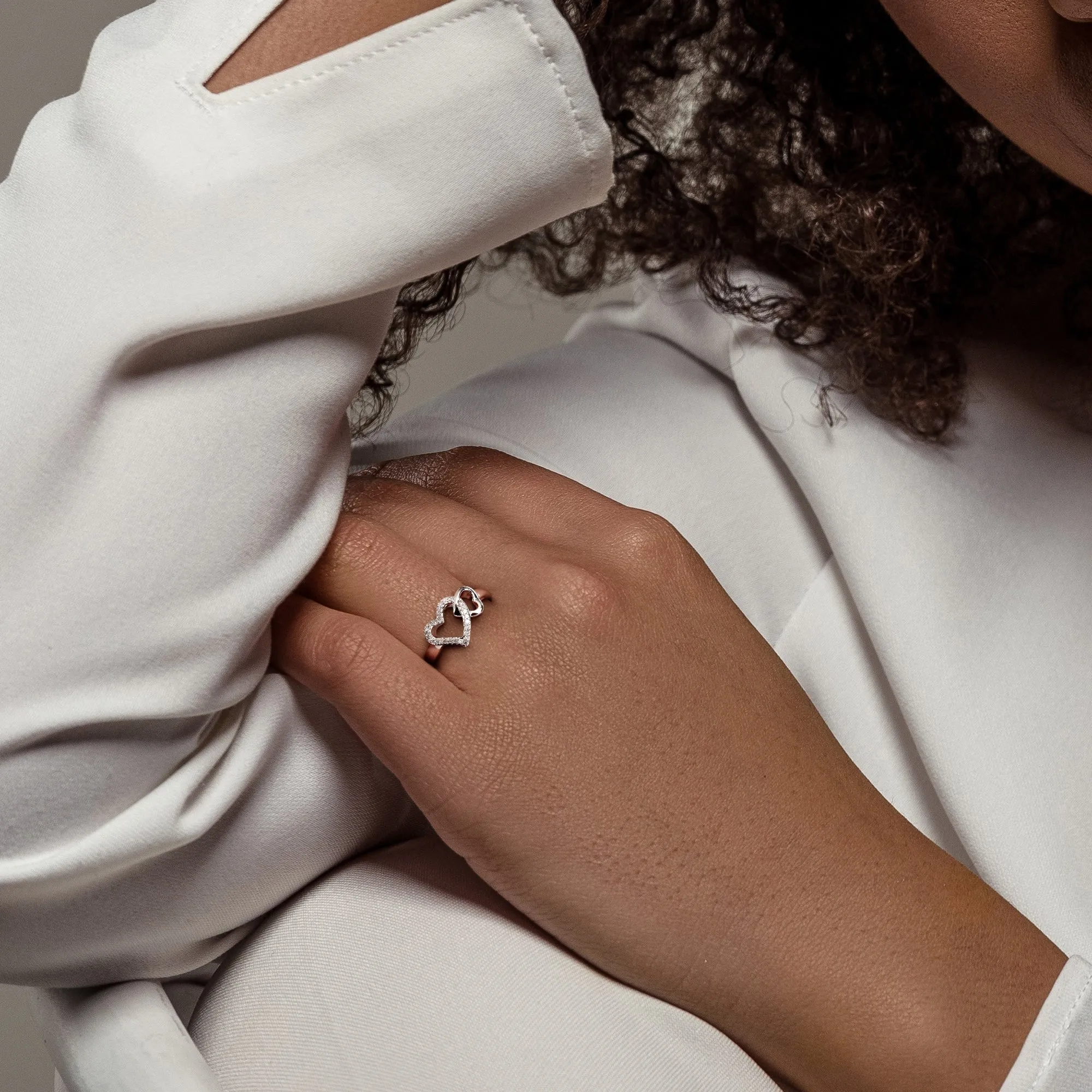 Miadora 1/10ct TW Diamond Double Heart Interlocked Ring in Sterling Silver sold by Zulily product image thumbnail 5