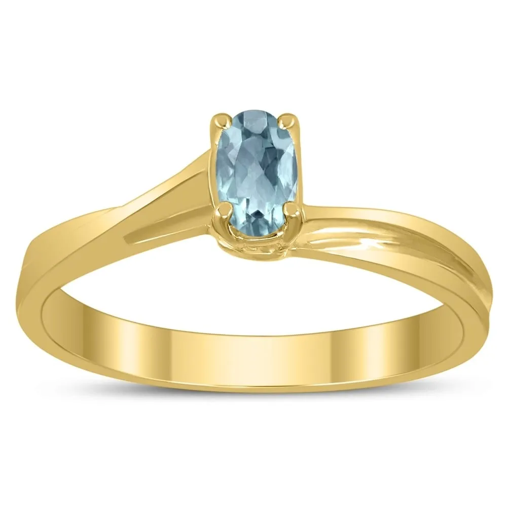 Solitaire Oval 5X3MM Aquamarine Gemstone Twist Ring in 10K Yellow Gold sold by Zulily