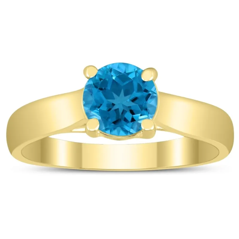 Round 6MM Blue Topaz Cathedral Solitaire Ring in 10K Yellow Gold sold by Zulily