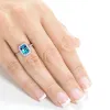 Annello by Kobelli 14k White Gold 1 3/4ct TGW Emerald Cut Swiss Blue Topaz and Diamond Halo Gemstone Ring sold by Zulily