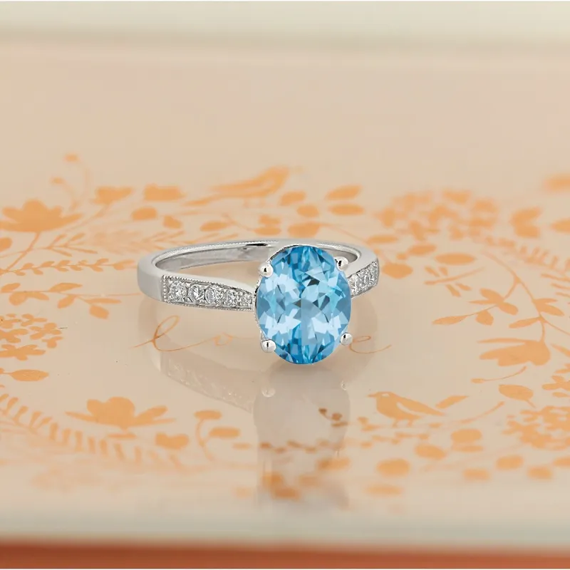 Auriya 3 1/3ct Fancy Oval Sky Blue Topaz and Diamond Engagement Ring 1/4ctw 14k Gold sold by Zulily