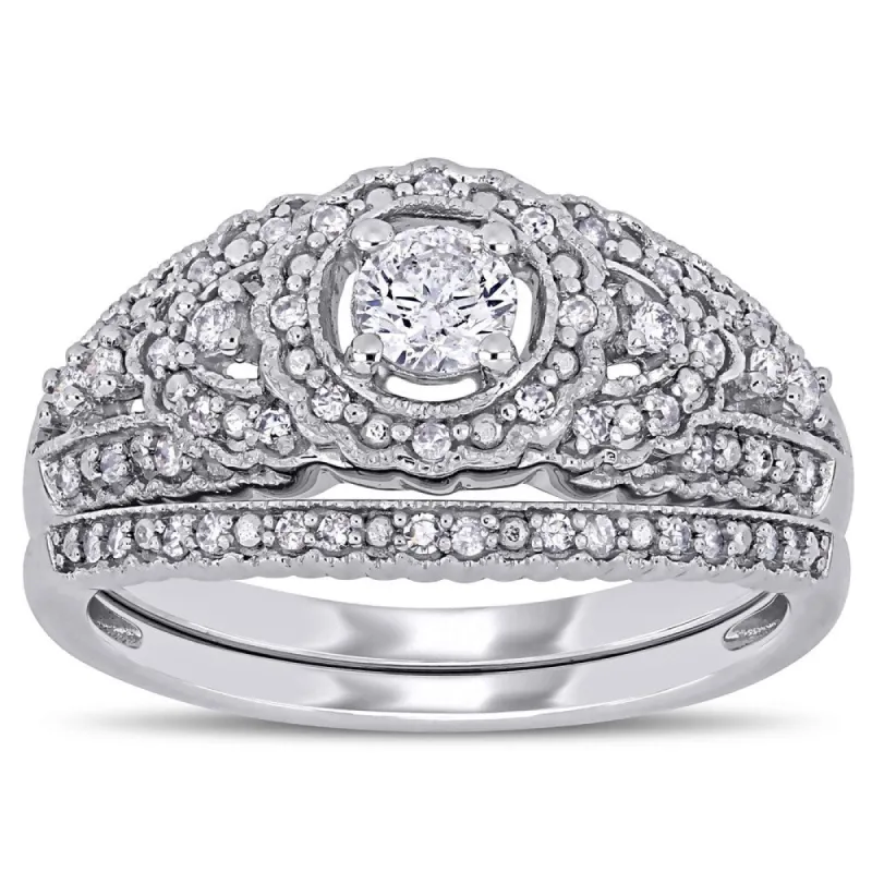 Miadora 10k White Gold 1/2ct TDW Diamond Floral Halo Bridal Ring Set sold by Zulily