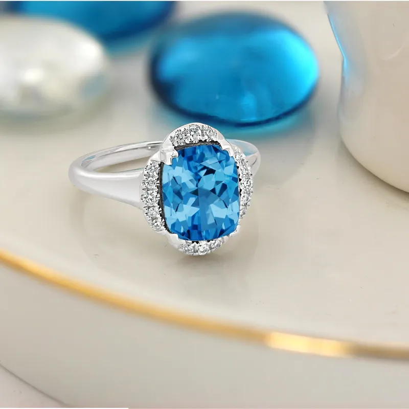 Auriya 4ct Cushion-cut Swiss Blue Topaz Halo Diamond Engagement Ring 1/8ctw 14k Gold sold by Zulily