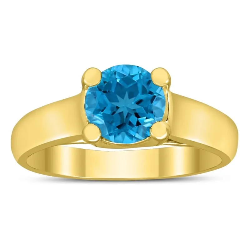Round 7MM Blue Topaz Cathedral Solitaire Ring in 10K Yellow Gold sold by Zulily