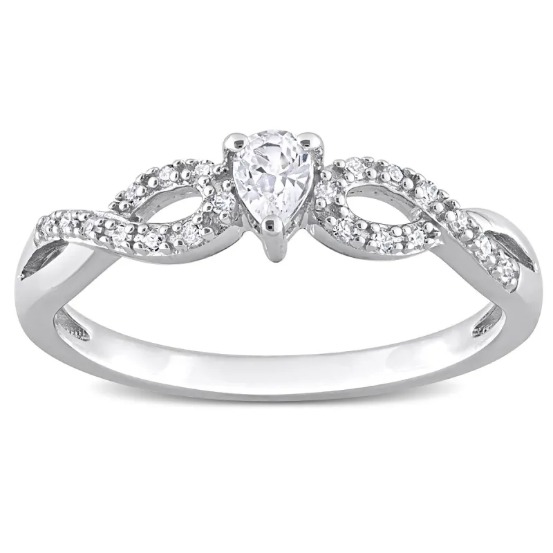 Miadora 1/10ct TDW Diamond and Created White Sapphire Infinity Engagement Ring in Sterling Silver sold by Zulily