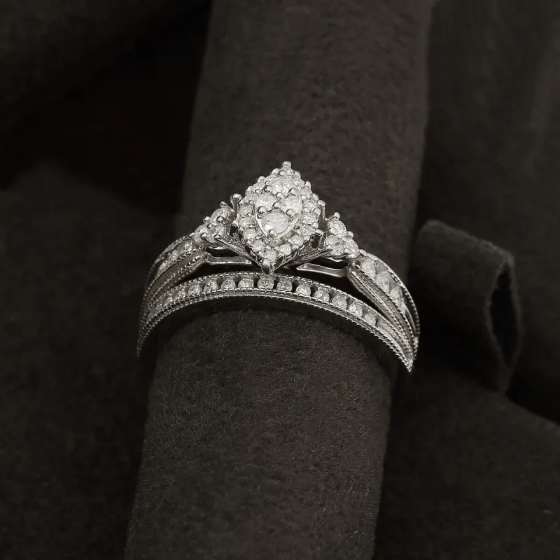 De Couer IGI Certified 10k White Gold 1/2ct TDW Diamond Marquise-framed Halo Engagement Ring Set sold by Zulily