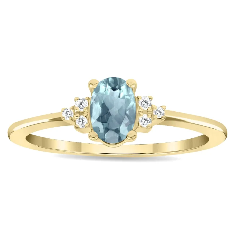 Women's Oval Shaped Aquamarine and Diamond Half Moon Ring in 10K Yellow Gold sold by Zulily