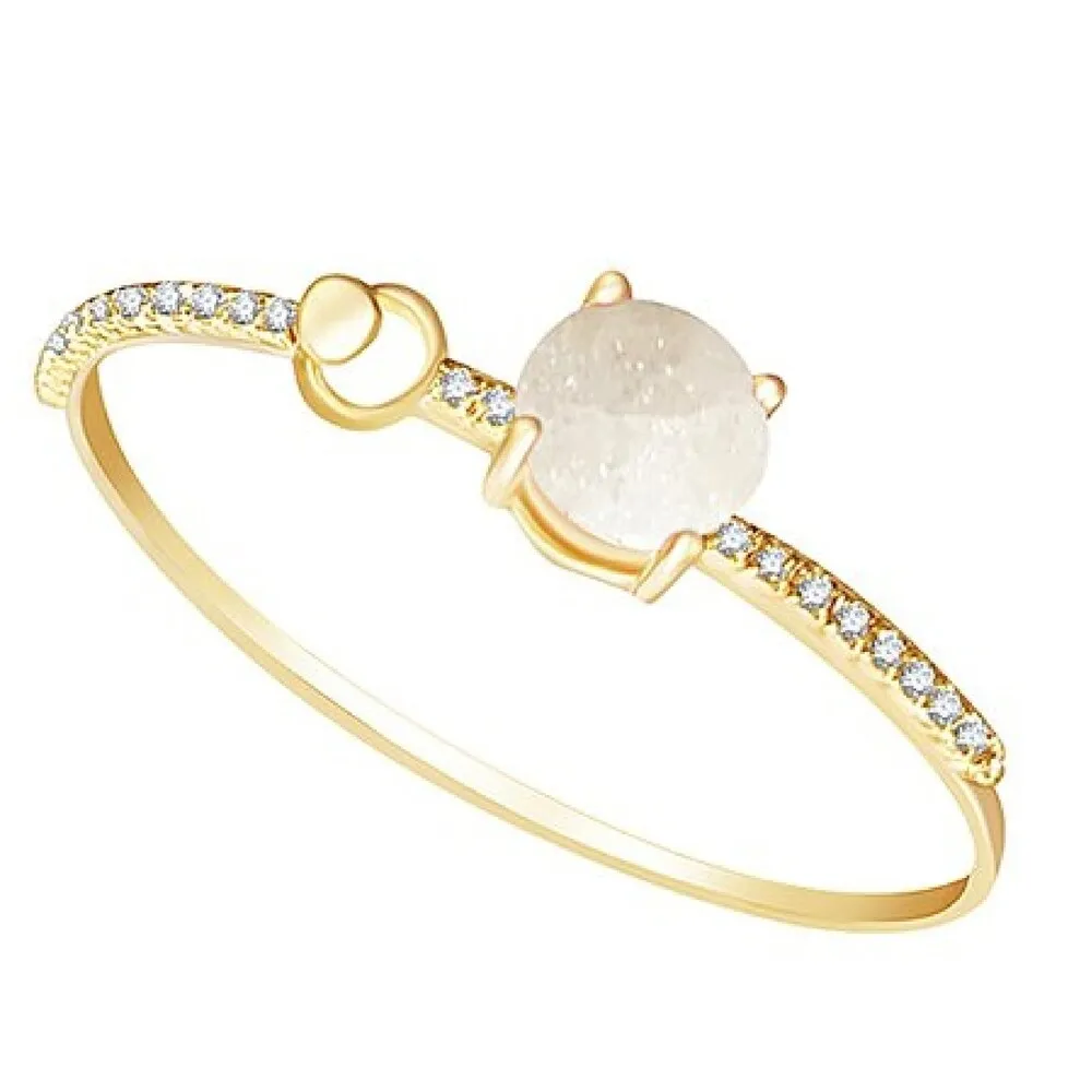 Goldtone Cuff Bangle Bracelet with White Opal and White Cubic Zirconia sold by Zulily
