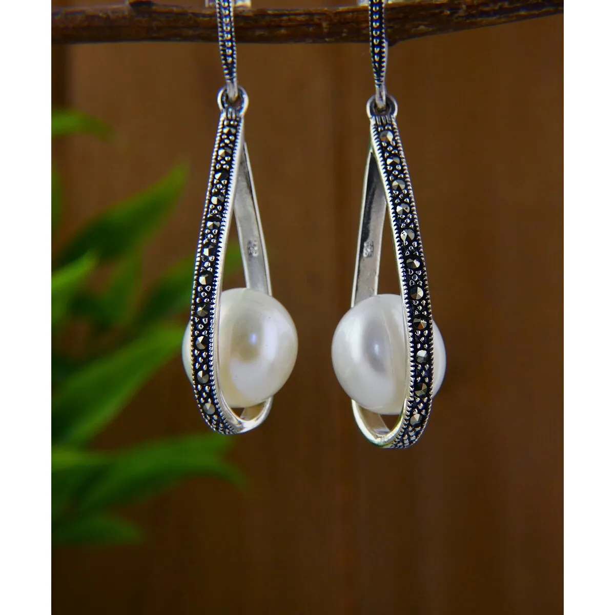 Tang & Song Sterling Silver Tear Drop Marcasite Swing with Freshwater Pearl sold by Zulily