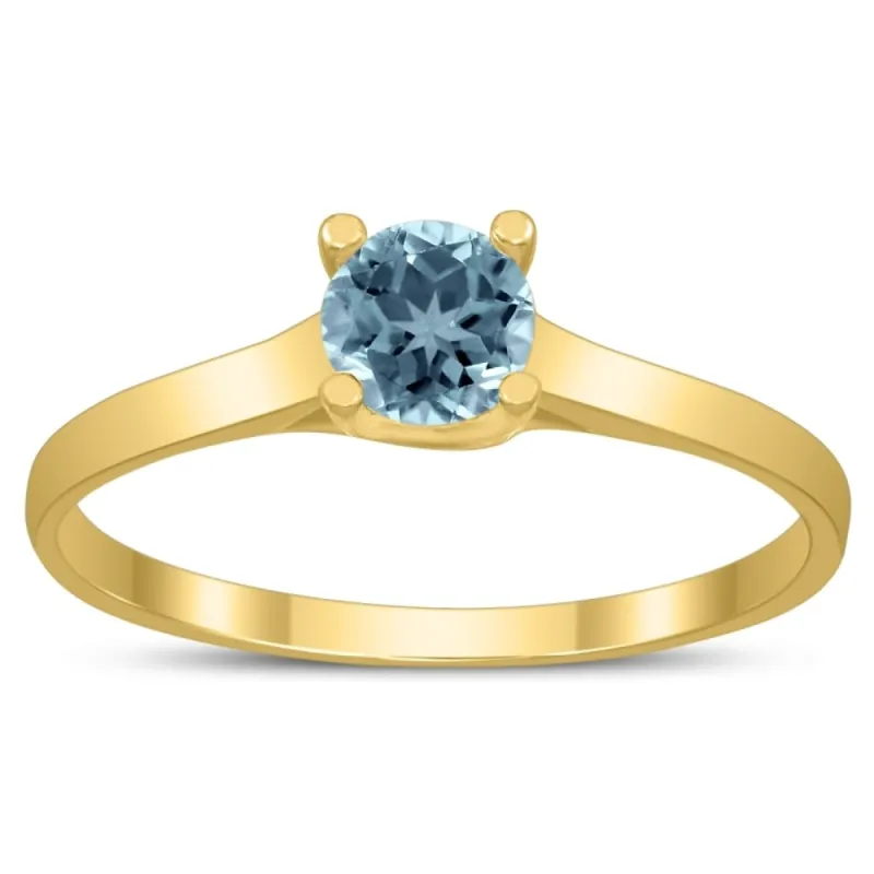 Round 4MM Aquamarine Cathedral Solitaire Ring in 10K Yellow Gold sold by Zulily