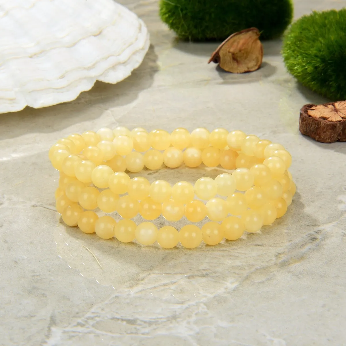 3 Wrap Stretch Bracelet or Necklace- Yellow Jade sold by Zulily