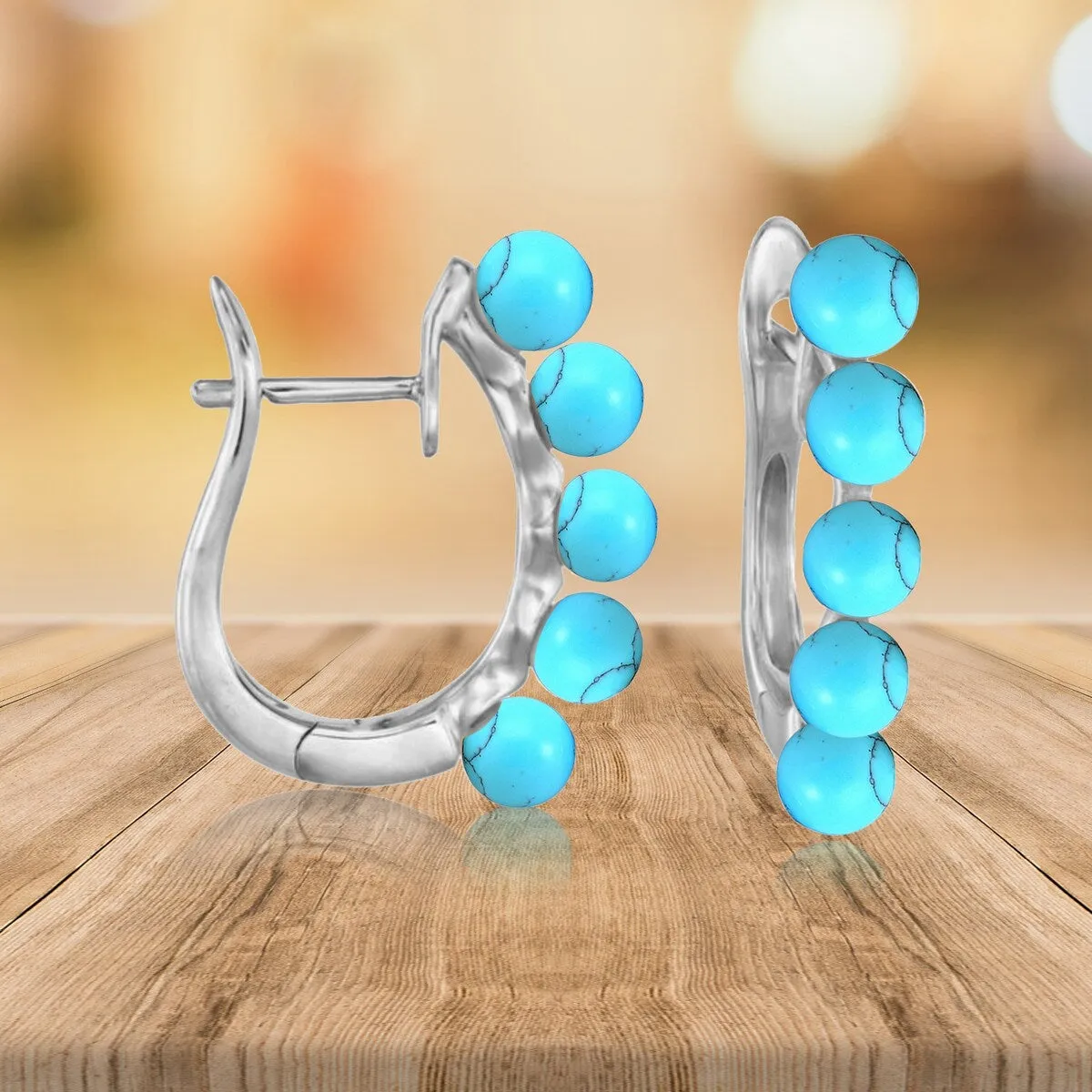 Sterling Silver with Natural Turquoise Hoop Earring sold by Zulily