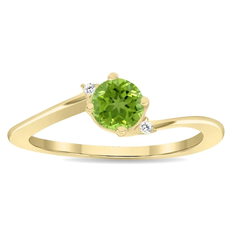 Women's Round Shaped Peridot and Diamond Wave Ring in 10K Yellow Gold sold by Zulily