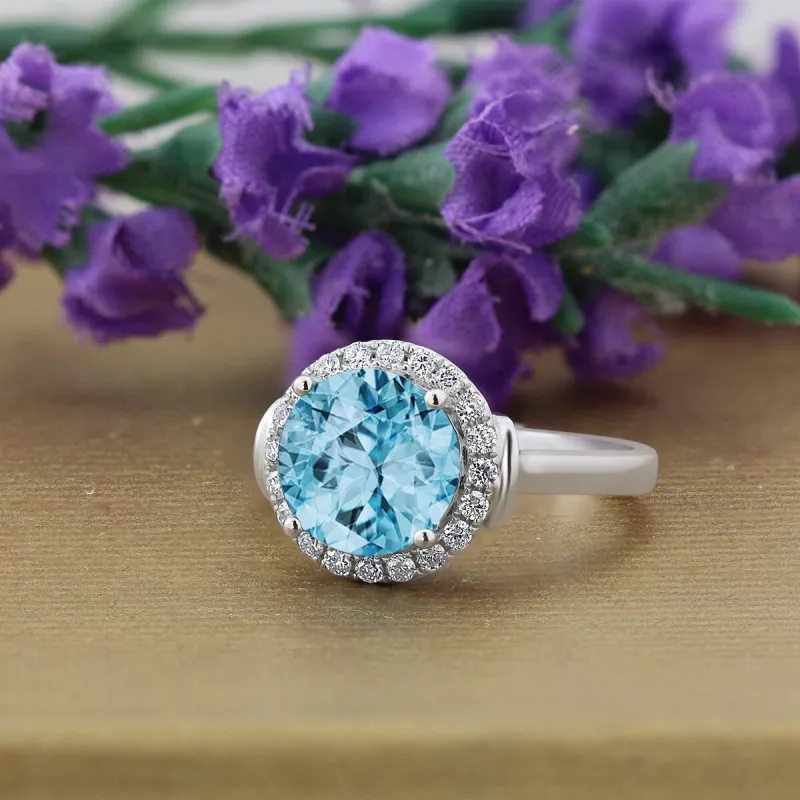 Auriya 3 5/8ct Round Sky Blue Topaz and Halo Diamond Engagement Ring 1/4ctw 14k Gold sold by Zulily