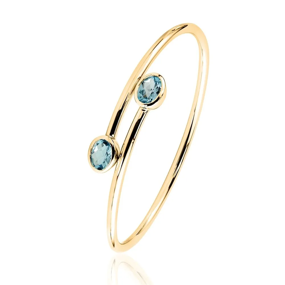 Auriya 2 3/4ct Oval Sky Blue Topaz Bypass Bangle Bracelet Gold over Silver sold by Zulily product image thumbnail 5