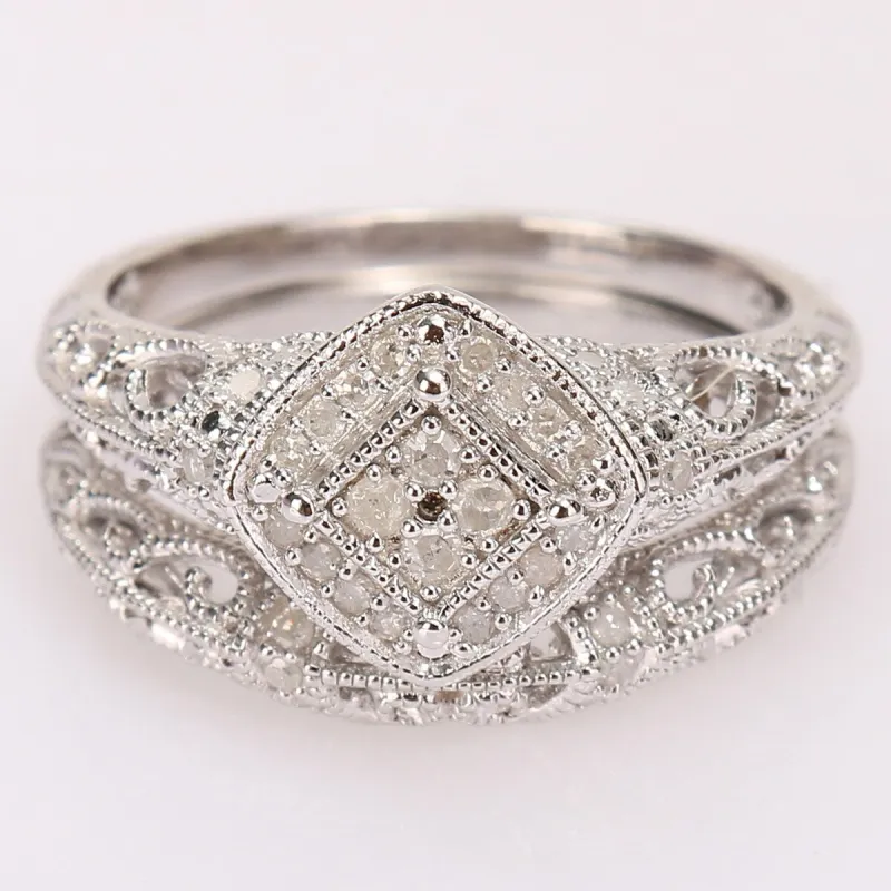 Miadora Sterling Silver 1/5ct TDW Diamond Vintage Bridal Ring Set sold by Zulily