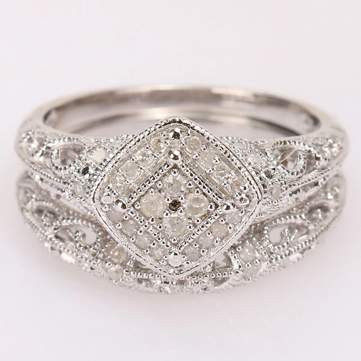 Miadora Sterling Silver 1/5ct TDW Diamond Vintage Bridal Ring Set sold by Zulily