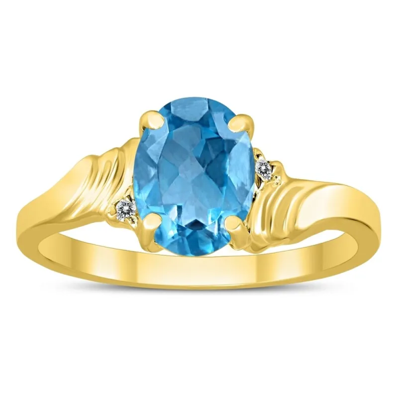 8X6MM Blue Topaz and Diamond Wave Ring in 10K Yellow Gold sold by Zulily